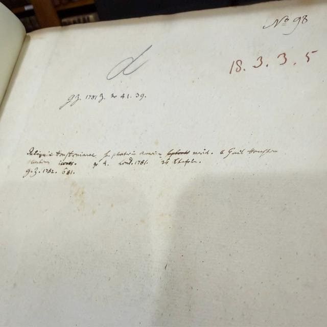 Nicolai Josephi Jacquin Selectarum Stirpium Americanarum Historia, in qua ad Linnæanum systema determinatæ descriptæque sistuntur plantæ illæ, quas in insulis Martinica, Jamaica, Domingo, aliisque, et in vicinæ continentis parte, observavit rariores; adjectis iconibus in solo natali delineatis. Translated: Nicolas Joseph Jacquin’s History of Selected American Plants, in which those rarer plants that he observed on the islands of Martinique, Jamaica, Santo Domingo, and others, as well as in a neighboring part of the continent, are identified according to the Linnaean system and described, with illustrations drawn in their native habitat. — photograph 5.