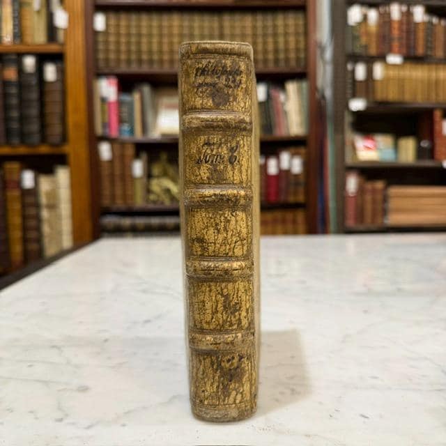 M. Tullii Ciceronis Philosophicorum Pars Secunda, Continens De Natura Deorum Libros III, De Divinatione Libros II, De Fato Librum I, De Legibus Libros III, and Fragmenta Librorum Philosophicorum; with M. Tullii Ciceronis De Officiis Libri III, Cato Maior, Seu De Senectute, Laelius, Seu De Amicitia, Paradoxa Stoicorum Sex, Fragmenta Poematum Including the Aratea, and De Petitione Consulatus. Ex Dionysii Lambini Emendatione. Translated: Cicero, Marcus Tullius. Philosophical Works, Parts Two and Three, Containing On the Nature of the Gods, On Divination, On Fate, On the Laws, On Duties, On Old Age, On Friendship, the Stoic Paradoxes, Poetical Fragments Including the Aratea, and On Canvassing for the Consulship. Edited and Annotated by Denis Lambin. Two Parts Bound in One Volume. — photograph 5.