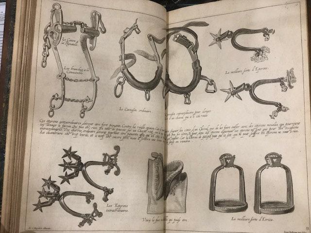 A General System of Horsemanship in All It's Branches: Containing a Faithful Translation of That Most Noble and Useful Work…Entitled The Manner of Feeding, Dressing, and Training of Horses for The Great Saddle, and Fitting Them for Service of The Field in Time of War, or For The Exercise and Improvement of Gentleman in The Academy at Home: A Science Peculiarly Necessary Throughout all Europe, and Which has Hitherto Been so Much Neglected, or Discouraged in England, That Young Gentlemen Have Been Obliged to Have Recourse to Foriegn Nations for This Part of Their Education. With All the Original Copper-Plates, in Number Forty-Three, which Were Engrav'd by the Best Foreign Masters, Under His Grace's Immediate Care and Inspection, and Which are Explained in The Different Lessons. And to Give All the Improvements that May Be, This Work is Ornamented with Head-Pieces and Initial Letters, Properly Adapted to the Subsequesnt Chapters; and Enlarged with an Index. Vol. II: I) Directions for the Choice of Stallions and Mares, and for Weaning and Managing of Foals, until they come to a proper Maturity for Service, suitable to the Uses they are design'd for. II)The Manner of Keeping, Soiling, Training, and Exercising Race-Horses, and Preparing them for the Course: Also Instructions for the Choice and Management of Hunters; and a Supplemental Discourfe concerning Hounds. III) The Perfect Knowledge of Horses; being a succinct Account of their various Disorders, both internal and external, and their good and bad Qualities; shewing the Seat, Cause, and Symptoms of all Diseases; with proper Recipes, and Methods of Cure, whether by manual Operation or otherwise; the like not hitherto extant in any Book of Farriery whatsoever in the English Tongue. Translated from the French Edition, published at the Hague, under the Inspection of the learned Dr. Boerhaave, by Gafper de Saunier, Riding-Master and Director to the Academy of Leyden; with the Addition of all his Father's Recipes and Remarks, who was forty Years Inspector-General of Lewis the XIVth's Great Stable. IV) The Osteology and Myology of a Horse: Or, an Anatomical Description of all the Bones and Muscles, that compose that most noble and useful Animal; pointing out their various Uses and Affections, and accounting for many other Particulars in the Oeconomy of a Horse, that are not generally known Illustrated with near thirty Copper-plates, in which the Seats of all Diseases are not only exactly described, but with several new Instruments requisite in the Cure of them most accurately described. And to give a more perfect Idea of the different Subjects, all the Anatomical Prints, representing the Muscles, Bones, &c. are wrought off in their proper Colours. To which is added, A large COLLECTION of RECIPES, Communicated by several Persons of Experience and Distinction: TOGETHER WITH TWO COMPLETE INDEXES, The one of DISEASES, the other of MEDICINES ALSO A DICTIONARY, explaining all the Technical Terms that belong to the Stud, the Stable, the Manage, Farriery, or whatever relates to HORSES. — photograph 8.