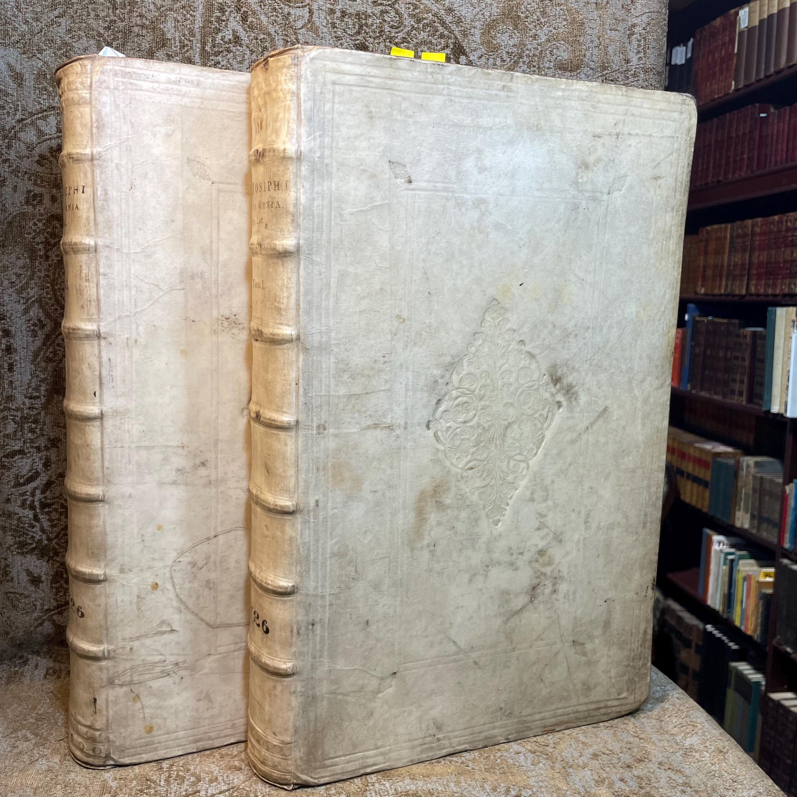 Flavii Josephi Quae Reperiri Potuerunt, Opera Omnia Graece et Latine, Cum Notis & Nova Versione Joannis Hudsoni, S.T.P. Aulae B. Mariae Virginis Principalis, & Bibliothecarii Bodlejani. Accedunt Nunc Primum Notae Integrae, ad Graeca Josephi & Varios Ejusdem Libros, D. Eduardi Bernardi, Jacobi Gronovii, Francisci Combefisii, Jo. Sibrandae, Hendr. Aldrichii. Ut & Ineditae In Universa Fl. Josephi Opera, Joannis Covvei, Ezechielis Spanhemii, Hadriani Relandi, & Selectae Aliorum. Adjiciuntur In Fine Caroli Daubuz Libri duo pro Testimonio Fl. Josephi de Jesu Christo; Et ejusdem Argumenti Epistolae XXX. virorum Doctorum, ut Reinesii, Snellii, Jo. Fr. Gronovii aliorumque, Philologicae & Historicae; ut & Petri Brinch Examen Chronologiae & Historiae Josephicae; Jo. Baptist. Ottii Animadversiones as Josephum & specimen Levici Flaviani; Christ. Noldii Historia Ideumaea, seu de Vita & Gestis Herodum &c. &c. Quorum Syllabus exstat ante Libri Primi Antiquitatum. Omnia collegit, disposuit, & post Jo. Hudsonum ad Codices fere omnes, cum inpressos, tum Manuscriptos, praecipue Lugduno-Batavos, diligenter recensuit, Notasque passim suas, & quinque in fibe Indices adjecit Sigebertus Havercampus; Linguae Graeca, Historiarum & Eloquentiae Professor, in Academia, quae Lugduni est, Batava. Tomis Duobus. Translated from Latin: "The Complete Works of Flavius Josephus That Could Be Found, in Greek and Latin, with Notes & a New Translation by John Hudson, S.T.P., Principal of St. Mary’s Hall and Bodleian Librarian. Additional Notes for the Greek Texts of Josephus and Various Books, by Edward Bernard, Jacob Gronovius, Francis Combefis, John Sibranda, Henry Aldrich. Also Added for the First Time are the Unpublished Notes on All of Flavius Josephus's Works by John Covell, Ezechiel Spanheim, Adriaan Reland, and Selected Others. Included at the End are Two Books by Charles Daubuz in Defense of Flavius Josephus's Testimony About Jesus Christ, as well as 30 Epistles of Learned Men on the Same Subject, such as Reinesius, Snellius, John Frederic Gronovius, and Others, Philological & Historical. Furthermore, Peter Brinch’s Examination of the Chronology and History of Josephus; John Baptist Ott’s Observations on Josephus and Specimen of Flavian Levite; Christian Nold's History of Idumea, or the Life & Acts of the Herods, etc., etc., the List of Which is Found Before the First Book of Antiquities. All Collected, Organized, and After John Hudson Were Carefully Reviewed Against Almost All the Codices, Both Printed and Manuscript, Especially Those of Leiden, with Notes Throughout by Sigebert Havercamp, Professor of the Greek Language, History, and Eloquence at the Academy of Leiden. In Two Volumes." — photograph 3.