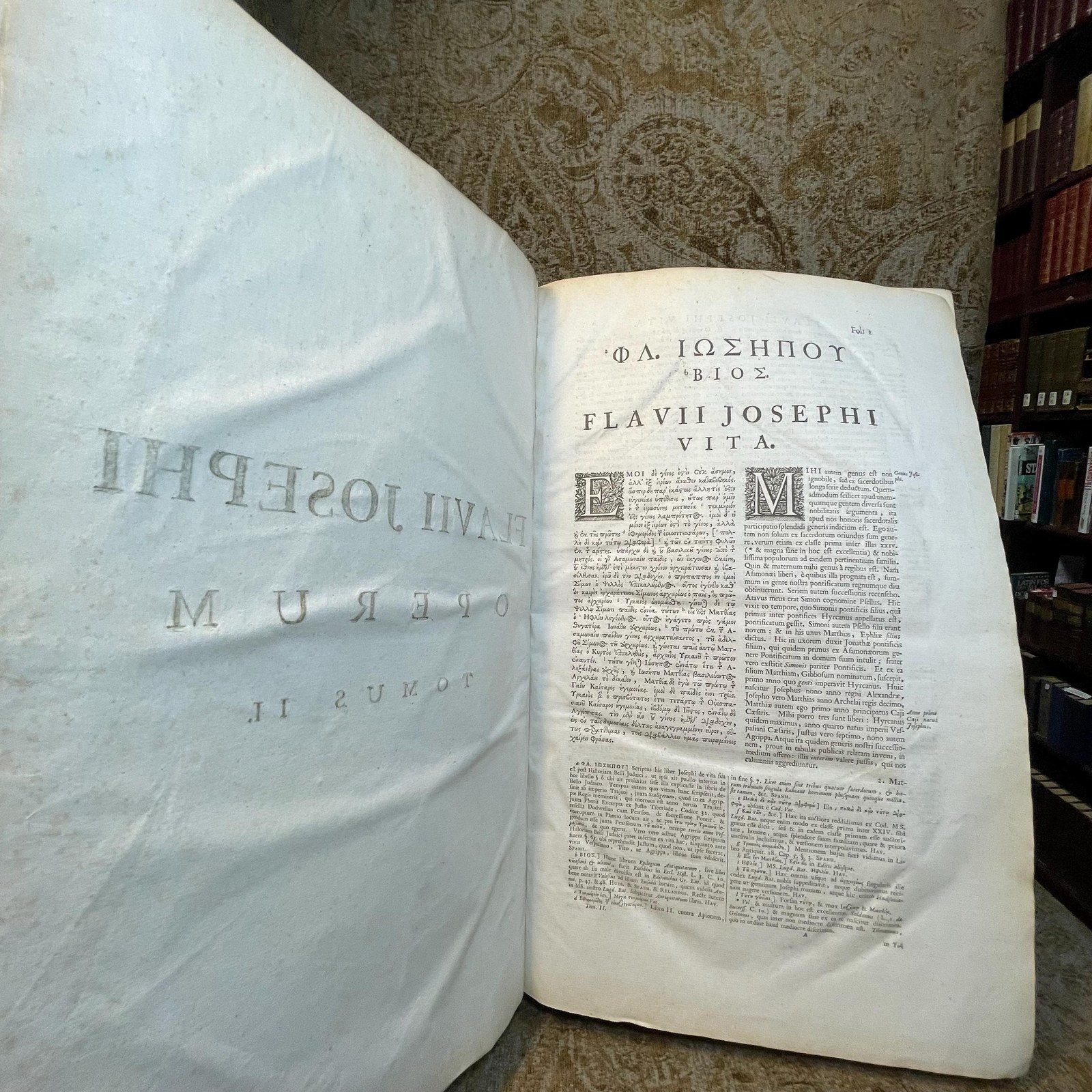 Flavii Josephi Quae Reperiri Potuerunt, Opera Omnia Graece et Latine, Cum Notis & Nova Versione Joannis Hudsoni, S.T.P. Aulae B. Mariae Virginis Principalis, & Bibliothecarii Bodlejani. Accedunt Nunc Primum Notae Integrae, ad Graeca Josephi & Varios Ejusdem Libros, D. Eduardi Bernardi, Jacobi Gronovii, Francisci Combefisii, Jo. Sibrandae, Hendr. Aldrichii. Ut & Ineditae In Universa Fl. Josephi Opera, Joannis Covvei, Ezechielis Spanhemii, Hadriani Relandi, & Selectae Aliorum. Adjiciuntur In Fine Caroli Daubuz Libri duo pro Testimonio Fl. Josephi de Jesu Christo; Et ejusdem Argumenti Epistolae XXX. virorum Doctorum, ut Reinesii, Snellii, Jo. Fr. Gronovii aliorumque, Philologicae & Historicae; ut & Petri Brinch Examen Chronologiae & Historiae Josephicae; Jo. Baptist. Ottii Animadversiones as Josephum & specimen Levici Flaviani; Christ. Noldii Historia Ideumaea, seu de Vita & Gestis Herodum &c. &c. Quorum Syllabus exstat ante Libri Primi Antiquitatum. Omnia collegit, disposuit, & post Jo. Hudsonum ad Codices fere omnes, cum inpressos, tum Manuscriptos, praecipue Lugduno-Batavos, diligenter recensuit, Notasque passim suas, & quinque in fibe Indices adjecit Sigebertus Havercampus; Linguae Graeca, Historiarum & Eloquentiae Professor, in Academia, quae Lugduni est, Batava. Tomis Duobus. Translated from Latin: "The Complete Works of Flavius Josephus That Could Be Found, in Greek and Latin, with Notes & a New Translation by John Hudson, S.T.P., Principal of St. Mary’s Hall and Bodleian Librarian. Additional Notes for the Greek Texts of Josephus and Various Books, by Edward Bernard, Jacob Gronovius, Francis Combefis, John Sibranda, Henry Aldrich. Also Added for the First Time are the Unpublished Notes on All of Flavius Josephus's Works by John Covell, Ezechiel Spanheim, Adriaan Reland, and Selected Others. Included at the End are Two Books by Charles Daubuz in Defense of Flavius Josephus's Testimony About Jesus Christ, as well as 30 Epistles of Learned Men on the Same Subject, such as Reinesius, Snellius, John Frederic Gronovius, and Others, Philological & Historical. Furthermore, Peter Brinch’s Examination of the Chronology and History of Josephus; John Baptist Ott’s Observations on Josephus and Specimen of Flavian Levite; Christian Nold's History of Idumea, or the Life & Acts of the Herods, etc., etc., the List of Which is Found Before the First Book of Antiquities. All Collected, Organized, and After John Hudson Were Carefully Reviewed Against Almost All the Codices, Both Printed and Manuscript, Especially Those of Leiden, with Notes Throughout by Sigebert Havercamp, Professor of the Greek Language, History, and Eloquence at the Academy of Leiden. In Two Volumes." — photograph 5.