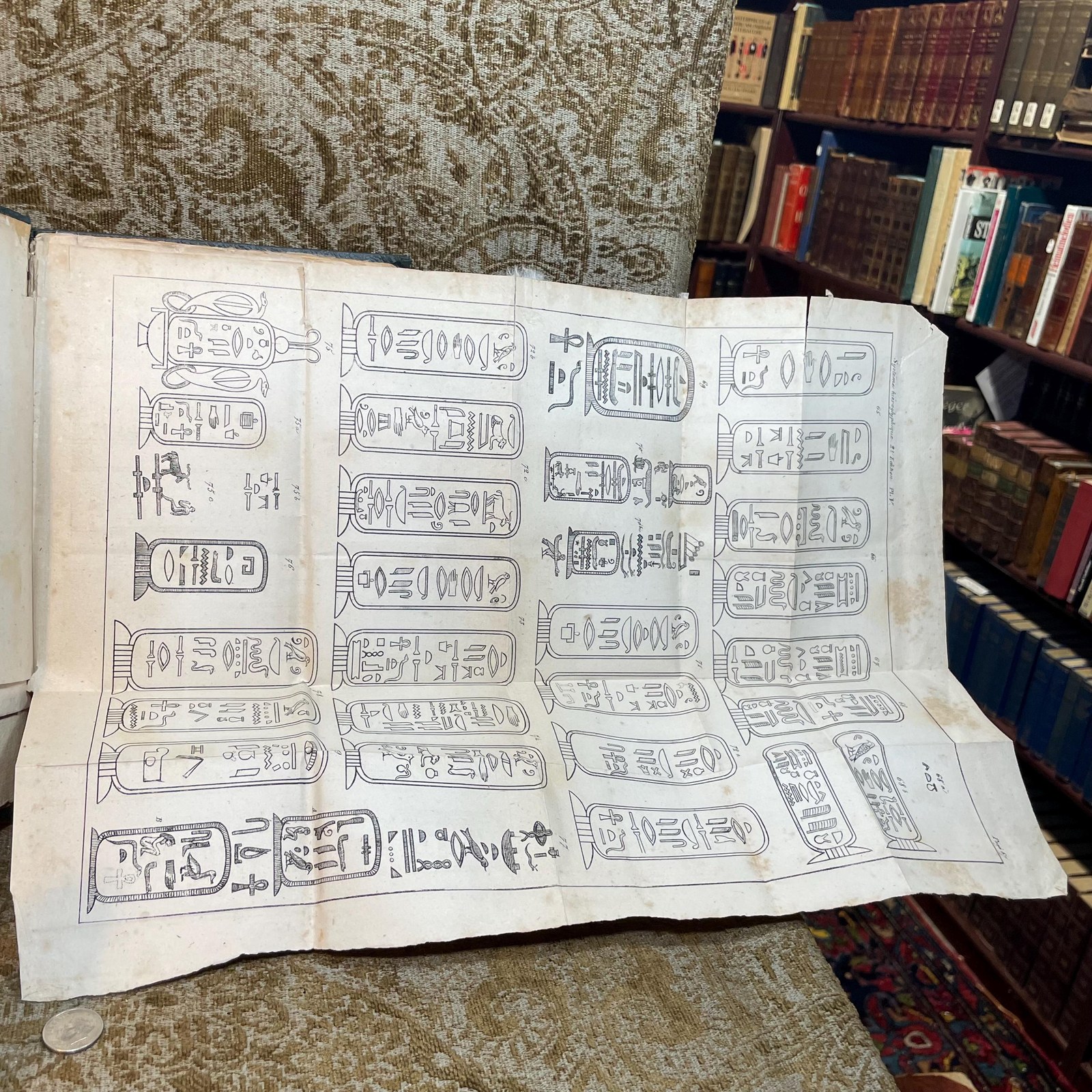 Précis du Système Hiéroglyphique des Anciens Égyptiens, ou Recherches sur les éléments premiers de cette écriture sacrée, sur leurs diverses combinaisons, et sur les rapports de ce système avec les autres méthodes graphiques égyptiennes; par M. Champollion le Jeune. Seconde édition, revue par l'auteur, et augmentée de la Lettre à M. Dacier, relative à l'Alphabet des hiéroglyphes phonétiques employés par les Égyptiens sur leurs monuments de l'époque grecque et de l'époque romaine. Planches et explication. Translated: Summary of the
Hieroglyphic System of the Ancient Egyptians, or Research on the primary elements of this sacred writing, on their various combinations, and on the relations of this system with other Egyptian graphic methods; by M. Champollion the Younger. Second edition, reviewed by the author and augmented by the Letter to M. Dacier, concerning the Alphabet of phonetic hieroglyphs used by the Egyptians on their monuments from the Greek and Roman periods. Plates and explanation. — photograph 10.
