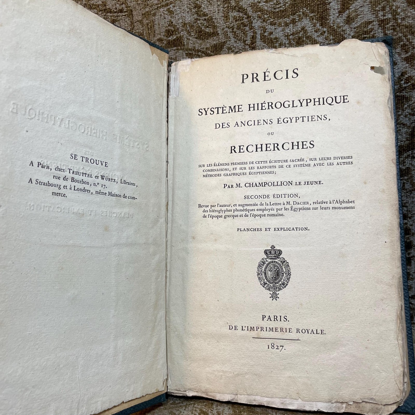 Précis du Système Hiéroglyphique des Anciens Égyptiens, ou Recherches sur les éléments premiers de cette écriture sacrée, sur leurs diverses combinaisons, et sur les rapports de ce système avec les autres méthodes graphiques égyptiennes; par M. Champollion le Jeune. Seconde édition, revue par l'auteur, et augmentée de la Lettre à M. Dacier, relative à l'Alphabet des hiéroglyphes phonétiques employés par les Égyptiens sur leurs monuments de l'époque grecque et de l'époque romaine. Planches et explication. Translated: Summary of the
Hieroglyphic System of the Ancient Egyptians, or Research on the primary elements of this sacred writing, on their various combinations, and on the relations of this system with other Egyptian graphic methods; by M. Champollion the Younger. Second edition, reviewed by the author and augmented by the Letter to M. Dacier, concerning the Alphabet of phonetic hieroglyphs used by the Egyptians on their monuments from the Greek and Roman periods. Plates and explanation. — photograph 4.