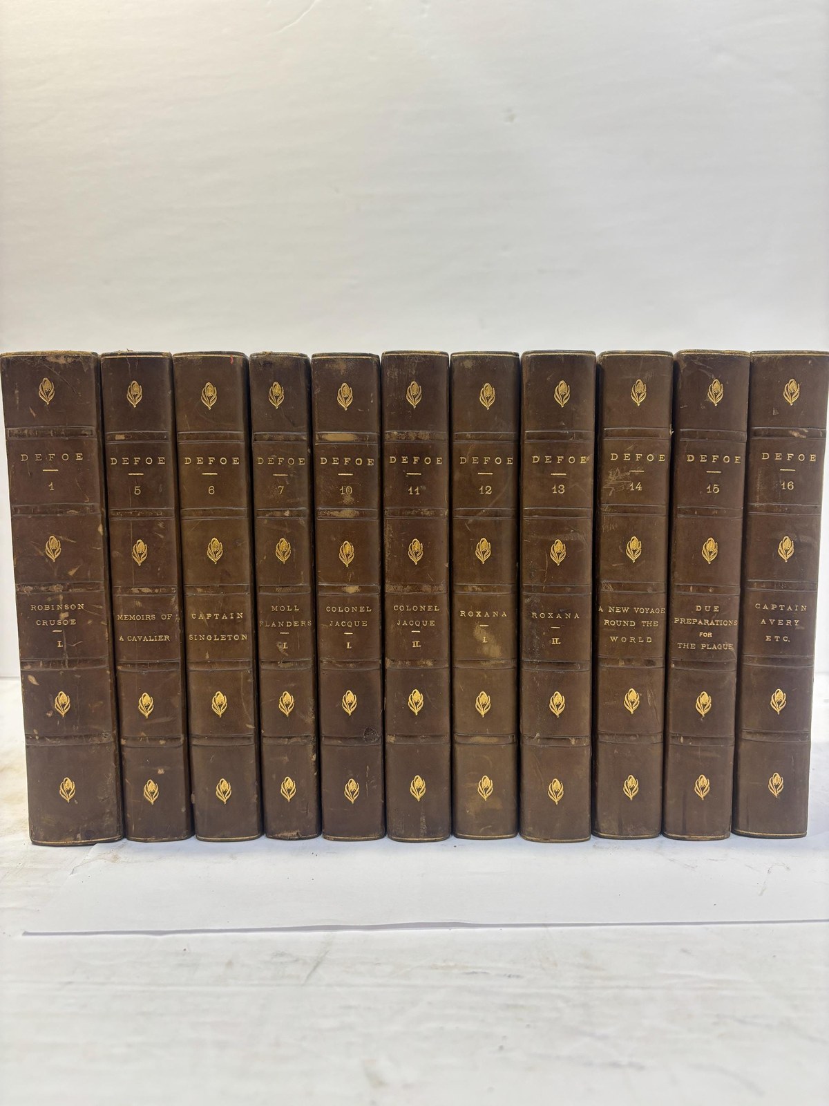 Romances and Narratives of Daniel Defoe in Sixteen (11) Volumes — photograph 2.