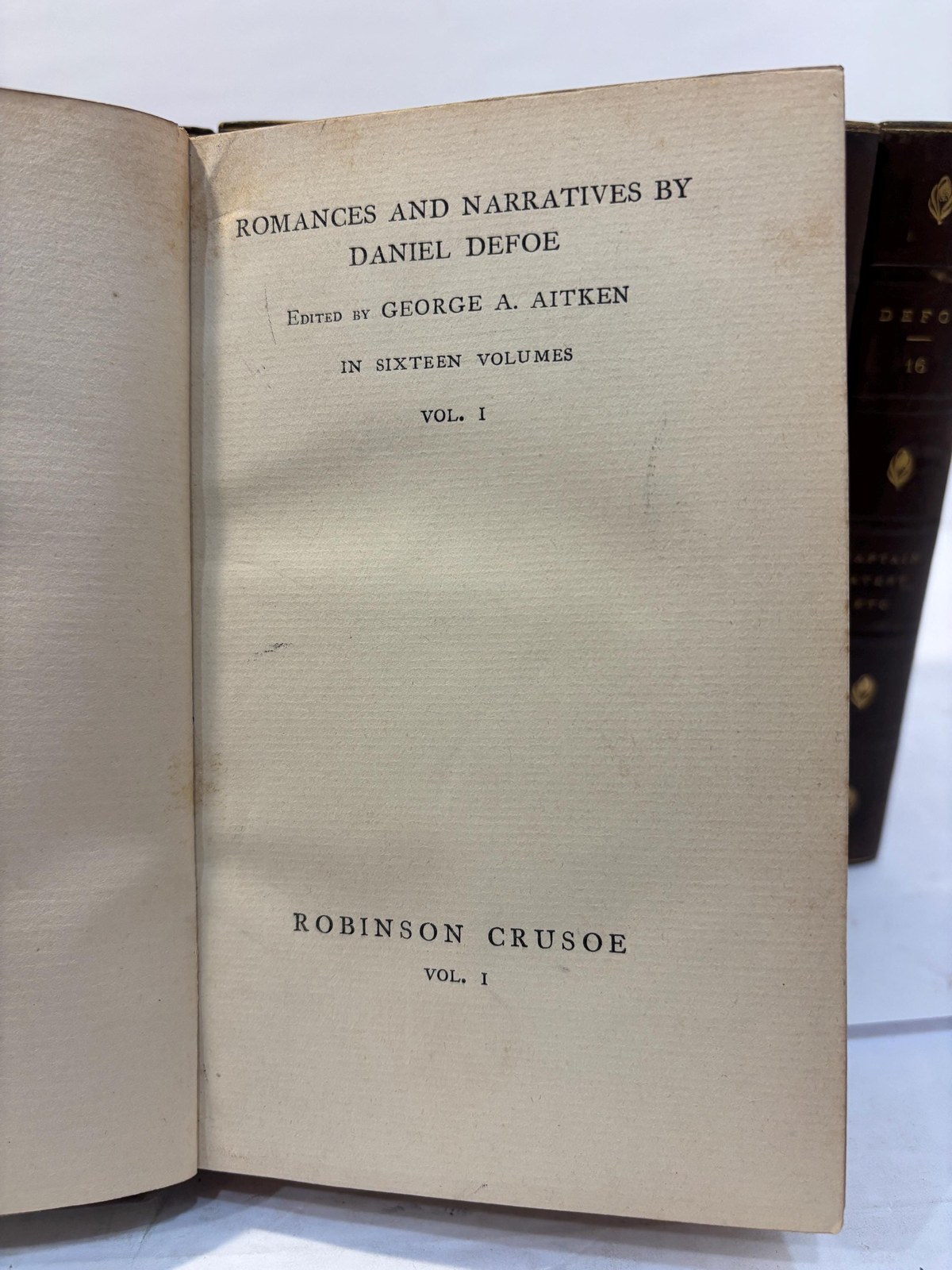 Romances and Narratives of Daniel Defoe in Sixteen (11) Volumes — photograph 3.