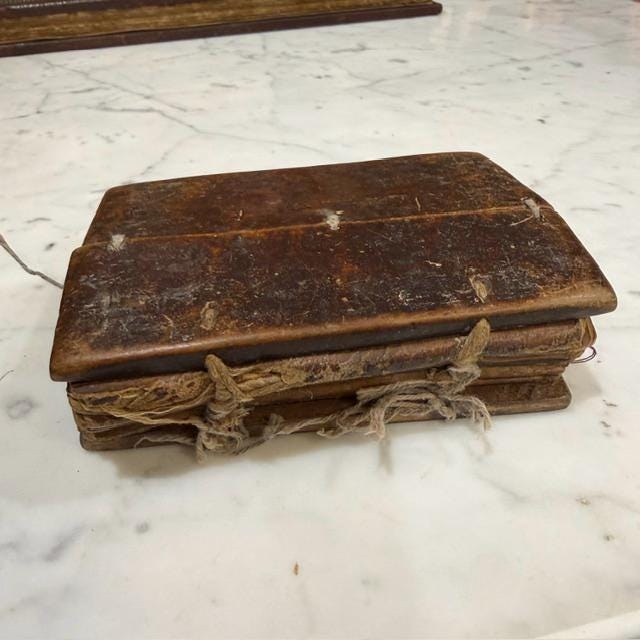 Ge'ez Language Devotional Prayer Book on Goatskin with Wood Covers. — photograph 10.