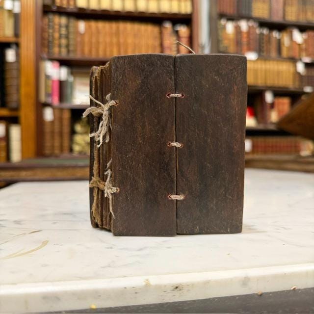 Ge'ez Language Devotional Prayer Book on Goatskin with Wood Covers. — photograph 2.