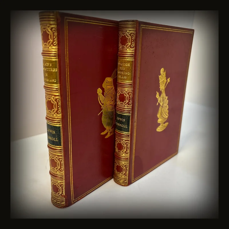 Through The Looking-Glass and What Alice Found There with Fifty Illustrations by John Tenniel (1935) AND Alice's Adventures in Wonderland with Forty-Two Illustrations by John Tenniel (1938).
