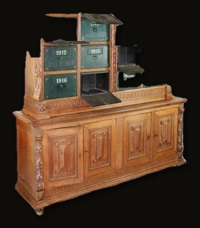 FRENCH NOTARY CABINET, 19th century, with lions in carved oak and 20 painted metal bins. Book case. Display case..
