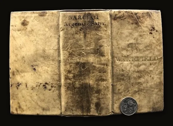 2 books bound as one. Argenis (Latin: Silver) and Euphormionis Lusinini, sive Ioannis Barclaii Satyricon, partes quinque cum clavi. Accessit Conspiratio Anglicana. (Latin: Euphormion Lusinini, or John Barclaius Satyricon, five parts with harpsichord. The English Conspiracy came.).